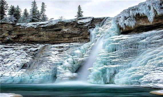 تصاویری بی‌نظیر و شگفت‌انگیز از منظره برفی آبشار کرکری