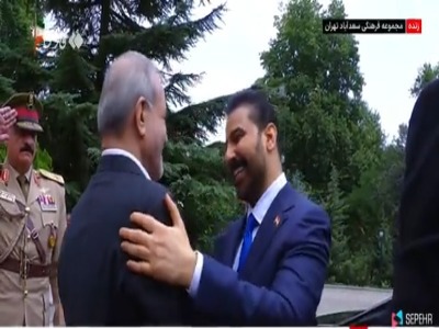 روبوسی پزشکیان با نخست‌وزیر عراق